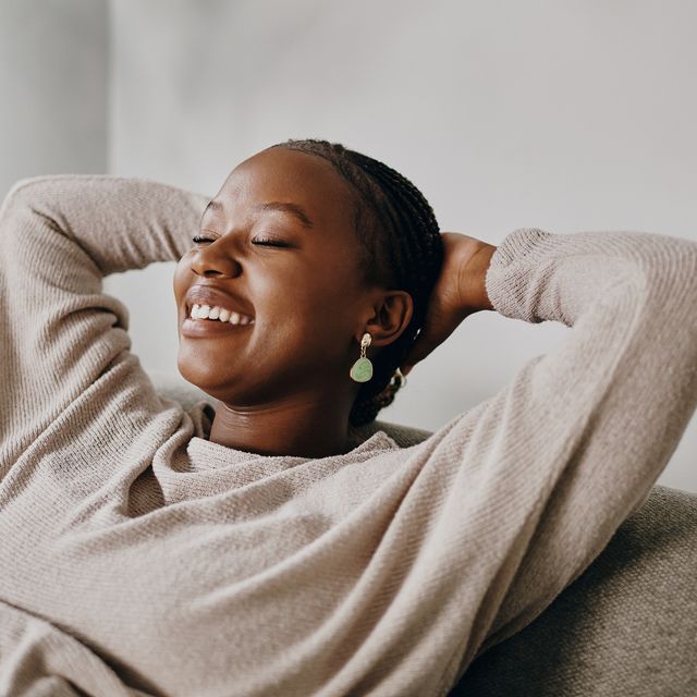 shot-of-a-young-woman-relaxing-on-the-sofa-at-home-royalty-free-image-1684938668.jpg